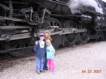 Picture Title - Charlie Ally and Becky stand in front of the masive drivers of 3751.