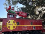 Picture Title - Dale setting the inflatable plane up on top of the caboose roof